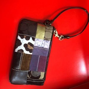 Patchwork coach wristlet
